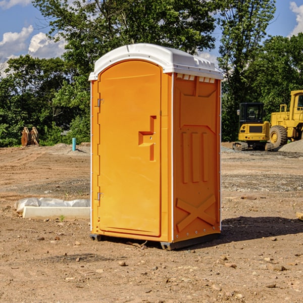 what is the cost difference between standard and deluxe portable restroom rentals in Elberta